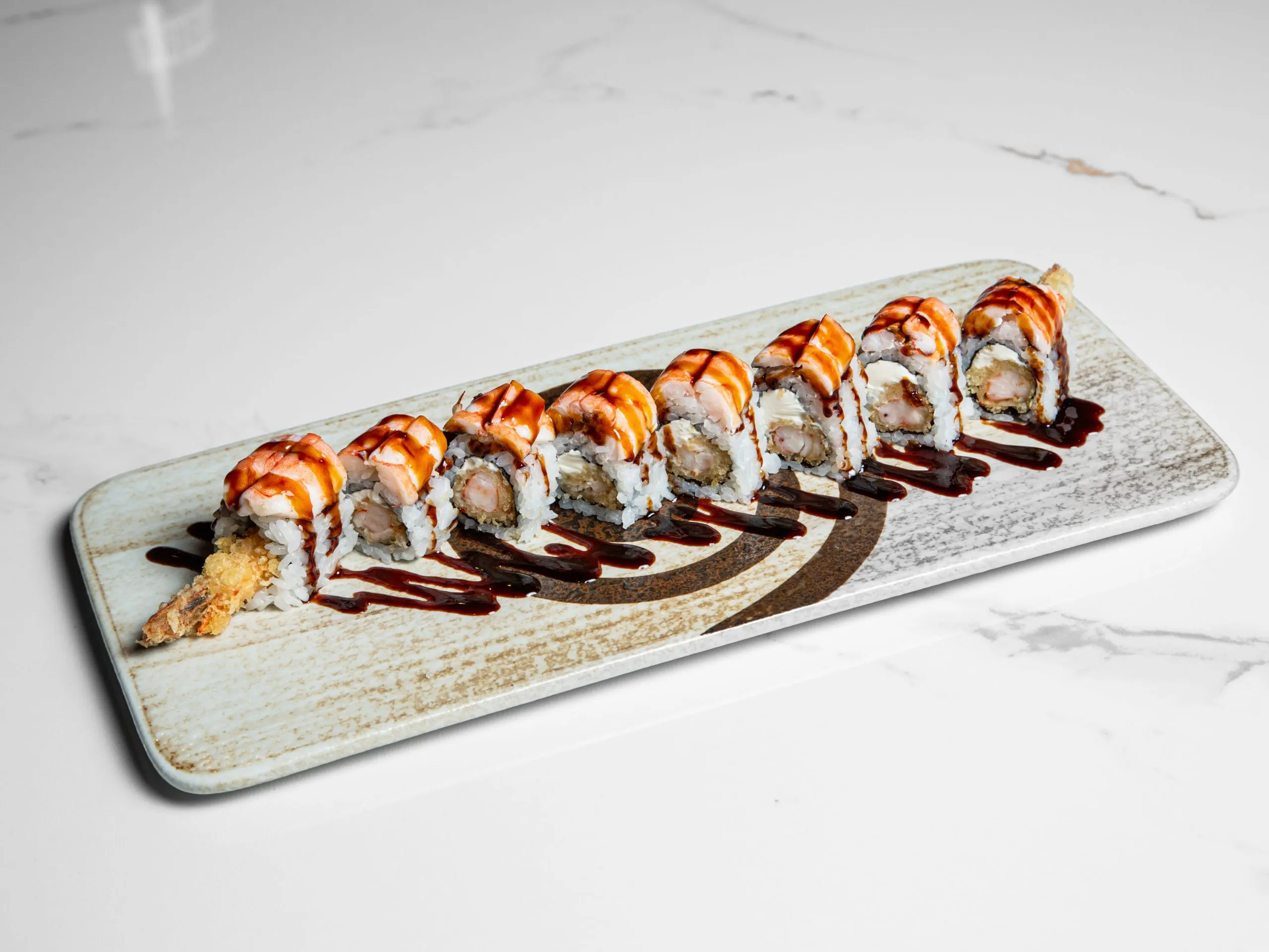 Sushi roll with double shrimp and spicy sauce at Kuchi, a Buffet Restaurant in Tampa