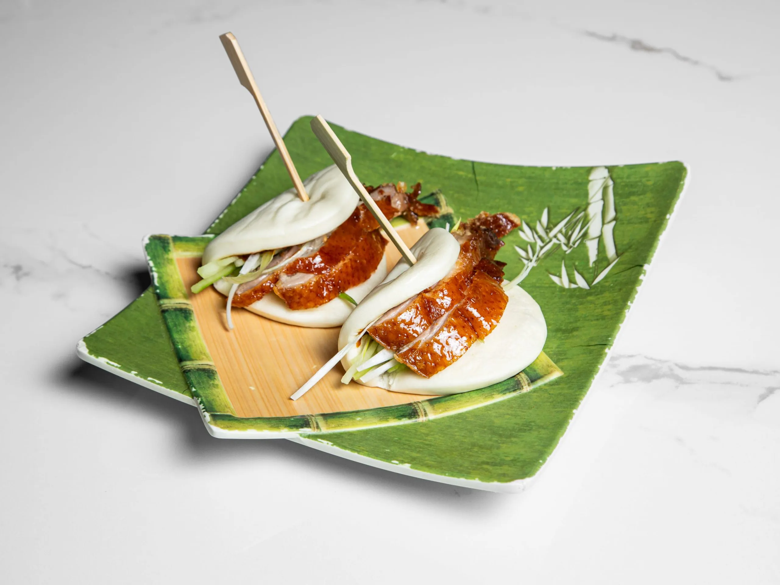 Steamed bun with Cantonese roast duck and greens at Kuchi, a Buffet Restaurant in Tampa